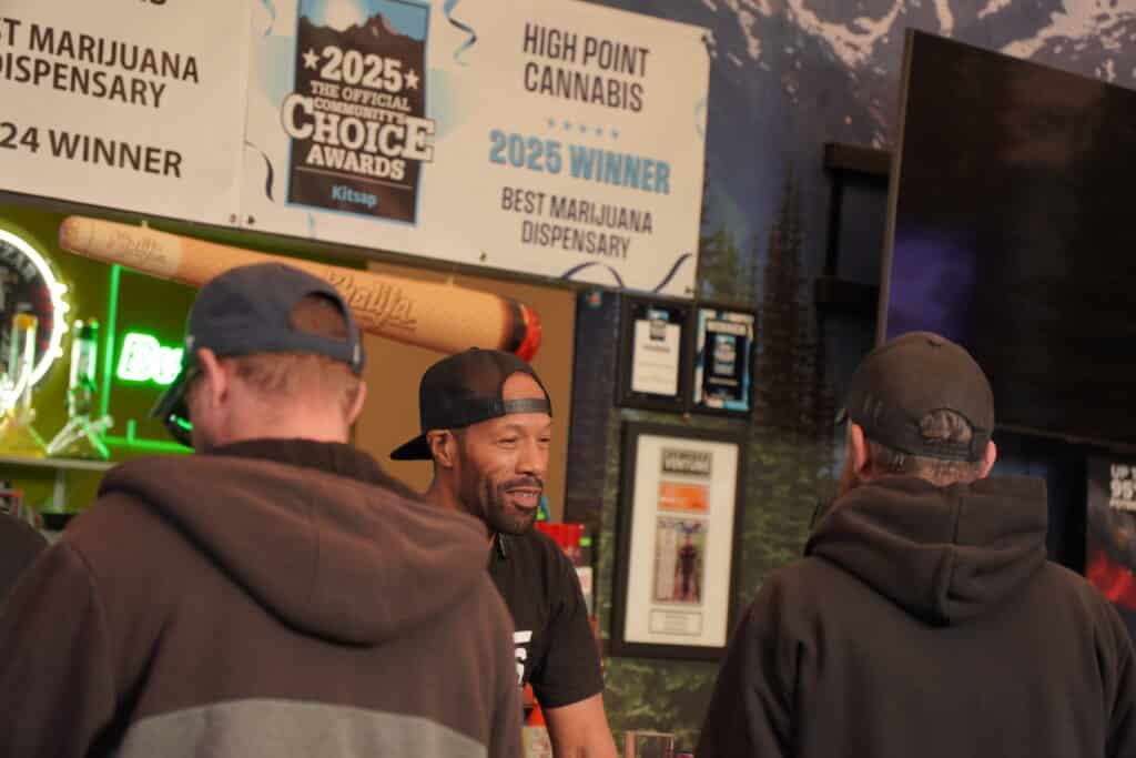 Dispensary staff interacting with customers