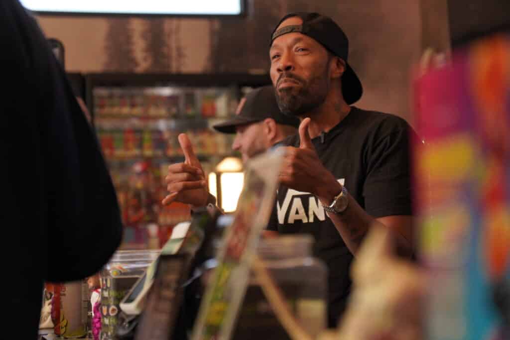 Man gesturing at a counter